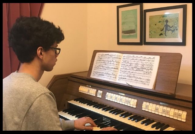 Dominic Remedios playing on his Viscount digital organ. Practising for entrance exams at home.