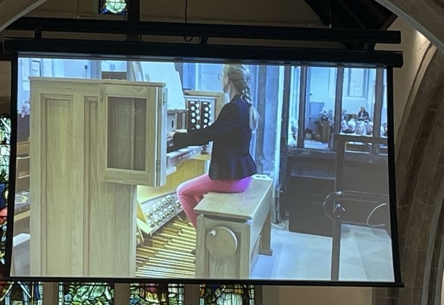 Organist Anna Lapwood on the big screen