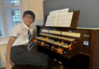 Happy student at Chorum S40 DLX organ console