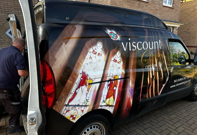 Viscount Organs van with doors open.