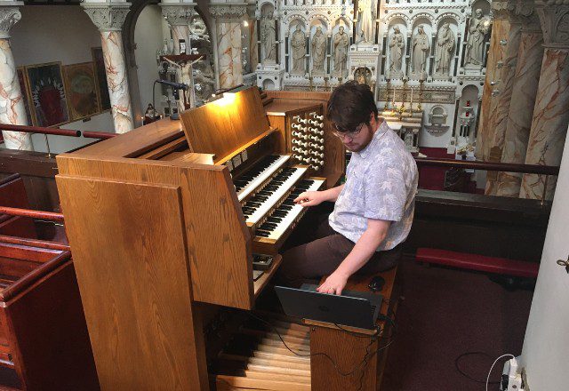 Cassian voicing the organ at St Mary's Mulberry