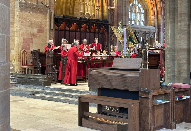Sherborne Abbey choir rehearsal with Viscount organ in foreground